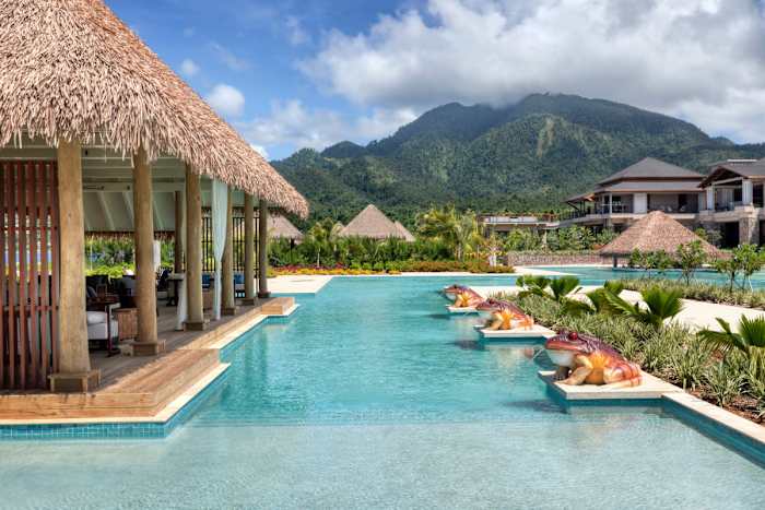 The pool and swim-up bar at Kwéyòl Beach Café.